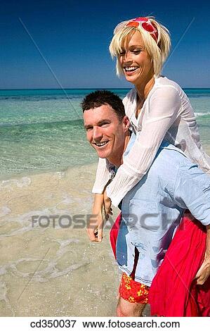 amusement, bonding, bond, beach, affection View Large Photo Image Stock Photo - amusement, bonding, bond, beach, affection. Fotosearch