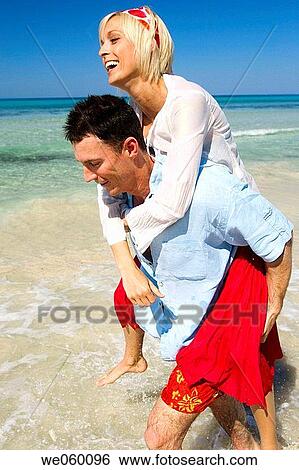 Stock Photograph - amusement, bonding, bond, beach, affection. Fotosearch