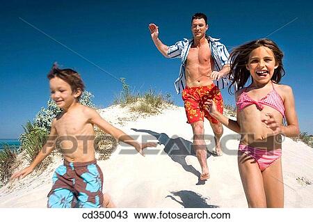 amusement, boy, beach, action View Large Photo Image Stock Image - amusement, boy, beach, action. Fotosearch