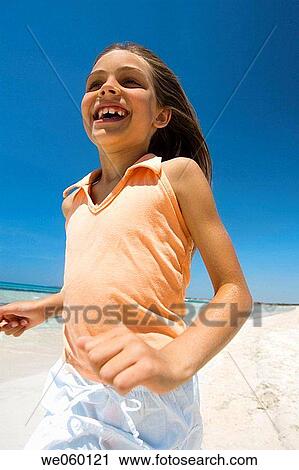 amusement, carefree, beach, action View Large Photo Image Stock Image - amusement, carefree, beach, action. Fotosearch