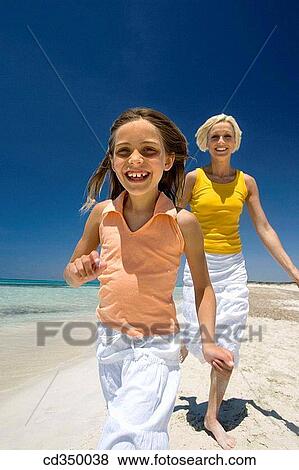 amusement, carefree, beach, barefoot, action View Large Photo Image Stock Photo - amusement, carefree, beach, barefoot, action. Fotosearch