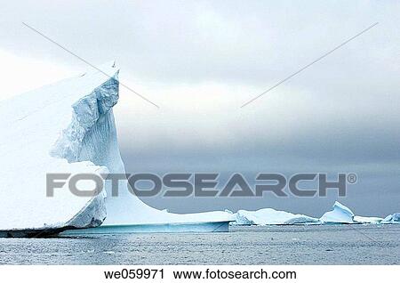 Stock Image - Antarctica, Antarctic Peninsula, Lemaire Channel, Iceberg near Pleneau Island.. Fotosearch