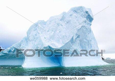 Antarctica, Antarctic Peninsula, Lemaire Channel, Iceberg near Pleneau Island. View Large Photo Image Stock Photo - Antarctica, Antarctic Peninsula, Lemaire Channel, Iceberg near Pleneau Island.. Fotosearch
