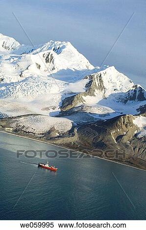 Antarctica, South Shetlands Islands, Livingston Island, False Bay, Helicopter flight on Huntress Glacier. Antarctic Dream ship. View Large Photo Image Stock Photography - Antarctica, South Shetlands Islands, Livingston Island, False Bay, Helicopter flight on Huntress Glacier. Antarctic Dream ship.. Fotosearch