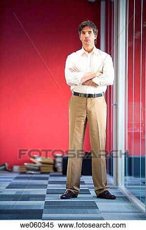 Stock Photography - arms folded, businessman, business, black hair, Arms crossed. Fotosearch
