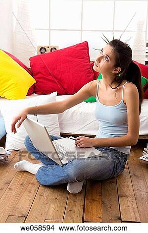 at-home, brunette, absorbed View Large Photo Image Picture - at-home, brunette, absorbed. Fotosearch