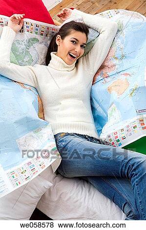 Stock Photo - at-home, brunette, Arms raised. Fotosearch