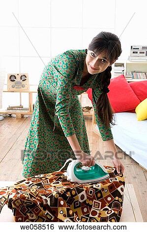at-home, brunette, blouse, appliance View Large Photo Image Stock Photograph - at-home, brunette, blouse, appliance. Fotosearch