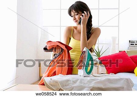 at-home, calling, brunette, appliance View Large Photo Image Picture - at-home, calling, brunette, appliance. Fotosearch
