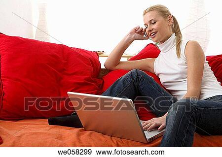 Stock Photo - at-home, calling, business, blond, appointment. Fotosearch