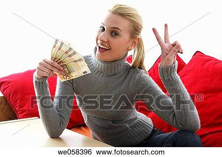 Stock Photograph - at-home, cash, bill, banknote, achievement. Fotosearch