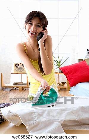 at-home, chat, brunette, appliance View Large Photo Image Stock Photo - at-home, chat, brunette, appliance. Fotosearch