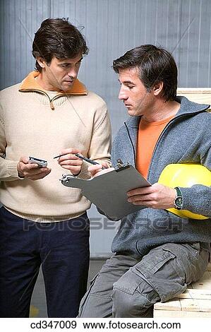 Stock Photo - Attache case, checking, check, agenda. Fotosearch