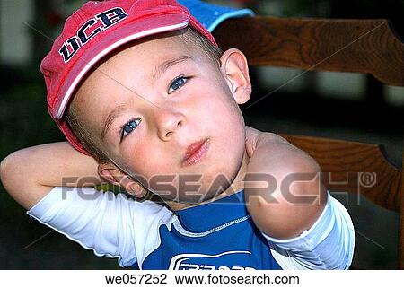 Stock Image - baby, cap, boy, blue eyes, 3-4 years. Fotosearch