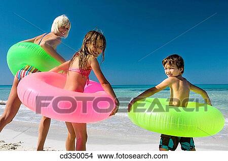 back view, beach, bathing, bathe, amusement View Large Photo Image Picture - back view, beach, bathing, bathe, amusement. Fotosearch