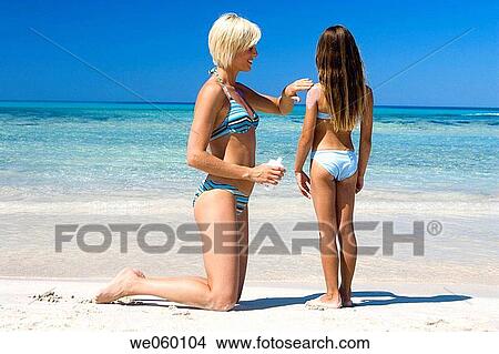 back view, Body care, beach, apply View Large Photo Image Picture - back view, Body care, beach, apply. Fotosearch