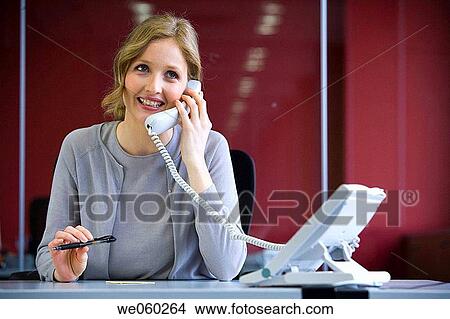 Ball-point pen, blond, blue eyes, business, businesspeople View Large Photo Image Picture - Ball-point pen, blond, blue eyes, business, businesspeople. Fotosearch