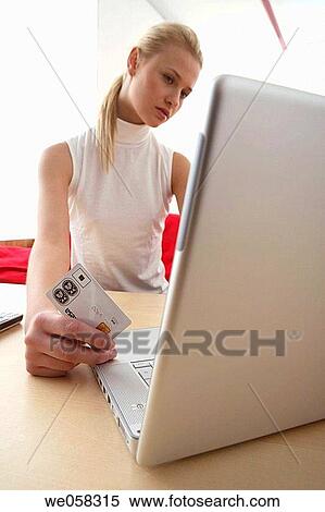 Bank card, blond, at-home View Large Photo Image Stock Photography - Bank card, blond, at-home. Fotosearch