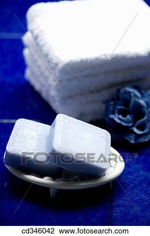 Stock Image - Bar of soap, Bars of soap, bathroom, blue, Body care, Close-up. Fotosearch