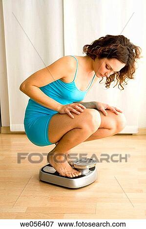 barefoot, Bathroom scale, brunette View Large Photo Image Stock Photo - barefoot, Bathroom scale, brunette. Fotosearch