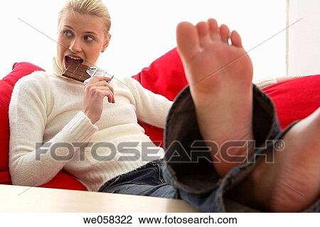 barefoot, blond, biting, bite, at-home View Large Photo Image Stock Image - barefoot, blond, biting, bite, at-home. Fotosearch