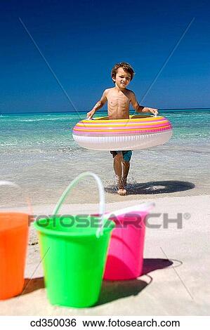 bathe, bathing, beach, boy, bucket View Large Photo Image Stock Photograph - bathe, bathing, beach, boy, bucket. Fotosearch