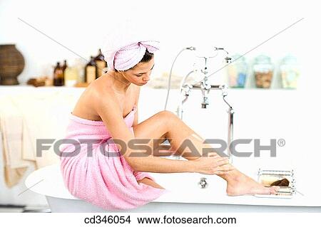 Picture - bathroom, brunette, Body care, bathtub, apply. Fotosearch
