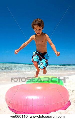 beach, activity, amusement, agility, agile, action View Large Photo Image Stock Image - beach, activity, amusement, agility, agile, action. Fotosearch