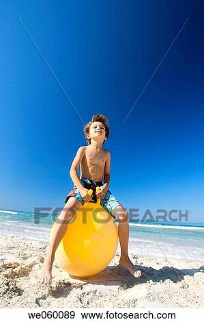 beach, activity, barefoot, ball, amusement, action View Large Photo Image Stock Photo - beach, activity, barefoot, ball, amusement, action. Fotosearch