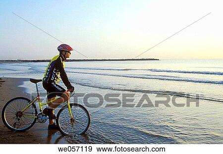 beach, bicycle, bicyclist, biker View Large Photo Image Stock Photo - beach, bicycle, bicyclist, biker. Fotosearch