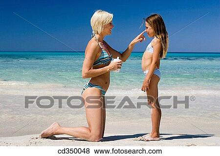 beach, Body care, apply View Large Photo Image Stock Photo - beach, Body care, apply. Fotosearch