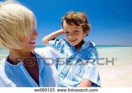 beach, bonding, bond, blue, affection View Large Photo Image Stock Image - beach, bonding, bond, blue, affection. Fotosearch