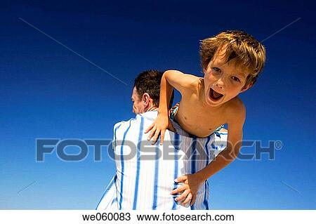 beach, boy, blue sky, blue, amusement View Large Photo Image Stock Image - beach, boy, blue sky, blue, amusement. Fotosearch