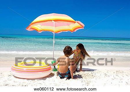 Stock Image - beach, brother, boy, amusement. Fotosearch
