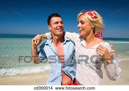 Picture - beach, carefree, bonding, bond, affection. Fotosearch