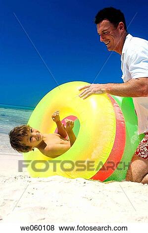 beach, catch, boy, amusement View Large Photo Image Stock Photo - beach, catch, boy, amusement. Fotosearch