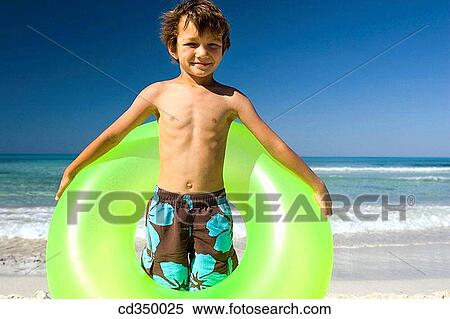 beach, childhood, child, boy, amusement View Large Photo Image Stock Photography - beach, childhood, child, boy, amusement. Fotosearch