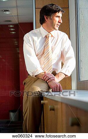 Picture - black hair, business, businessman, businesspeople. Fotosearch