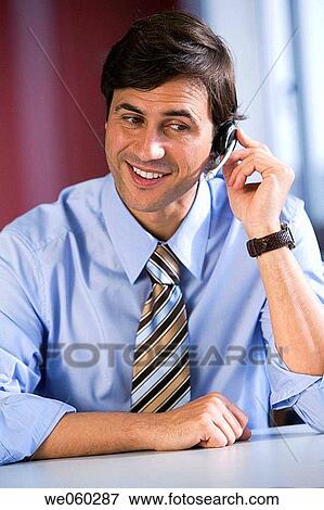 Stock Photo - black hair, business, businessman, businesspeople. Fotosearch