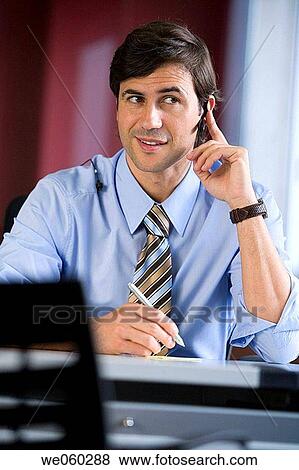 Stock Photo - black hair, business, businessman, businesspeople. Fotosearch