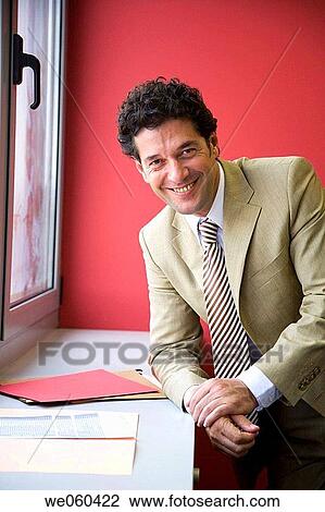 Stock Image - black hair, businesspeople, businessman, business, achievement. Fotosearch
