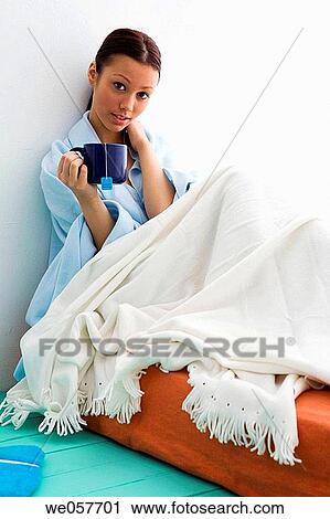 Stock Image - blanket, brunette, carnality. Fotosearch
