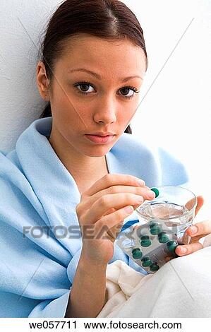 Stock Image - blister-pack, brunette, dark hair. Fotosearch