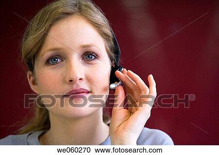 Stock Image - blond, blue eyes, business, businesspeople, businesswoman. Fotosearch