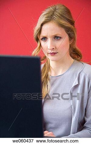 Stock Photo - blond, blue eyes, business, businesspeople, businesswoman. Fotosearch