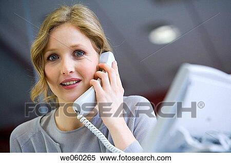 Stock Photography - blond, blue eyes, business, businesspeople, businesswoman. Fotosearch