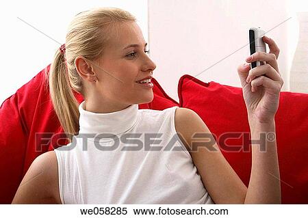 blond, cell phone, calling, addiction View Large Photo Image Stock Photography - blond, cell phone, calling, addiction. Fotosearch