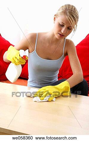 Stock Image - blond, cleaning, clean, at-home. Fotosearch