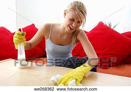 Stock Image - blond, cleaning, clean, at-home. Fotosearch