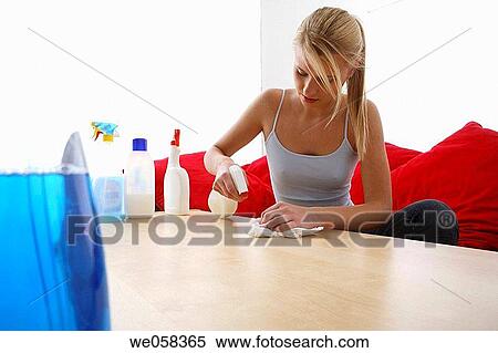 Stock Photography - blond, cleaning, clean, at-home. Fotosearch